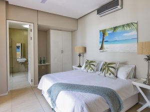 Bedroom with seaview at Sovereign Sands the luxurious beach Holiday Villa on the North Coast. This 8 sleeper is the epitome of self-catering excellence, a perfect holiday home.